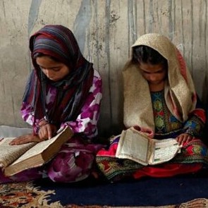 A photo of Afghan girls studying is included for decorative purposes.