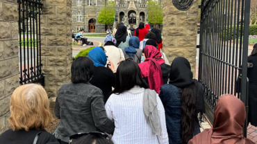 Photo of evacuated Afghan women leaders arriving on the campus of Georgetown University during a retreat in April 2022.